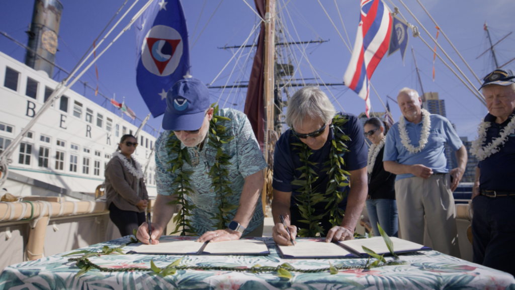 NOAA Administrator Rick Spinrad, Ph.D., and Polynesian Voyaging Society CEO Nainoa Thompson signed the MOU in San Diego, California, aboard Hōkūle‘a. (Image credit: Ryan Miyamoto)